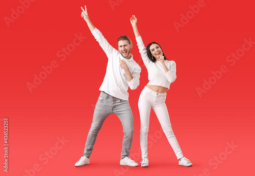 Happy young couple dancing ...