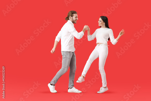 Happy young couple dancing ...