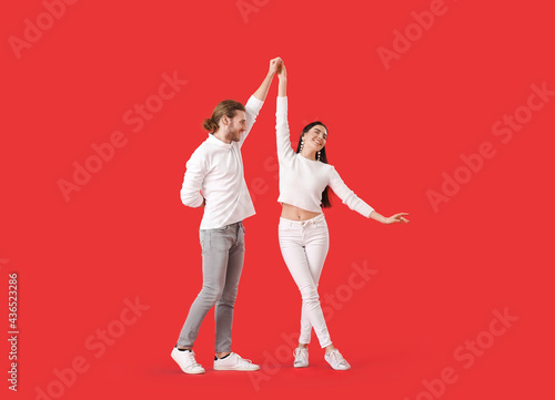 Happy young couple dancing ...