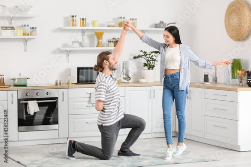 Happy young couple dancing ...