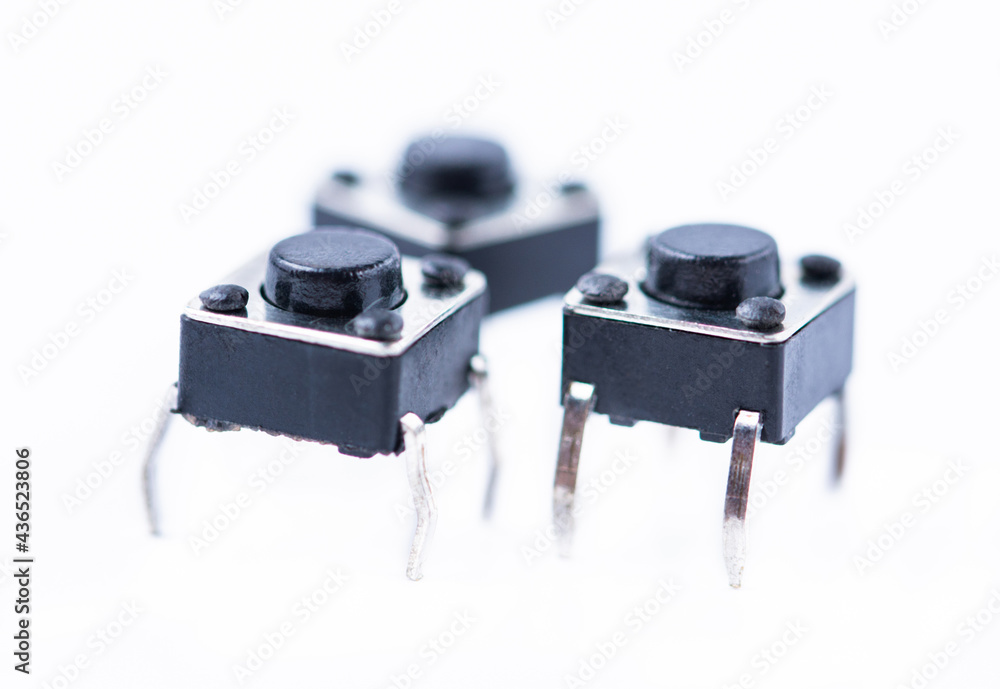 Set of small buttons for electronic devices and arduino kits isolated on white background. Set of small buttons for electronic devices and arduino kits isolated on white background.