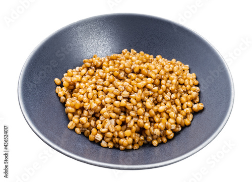 porridge from whole-grain wheat in gray bowl