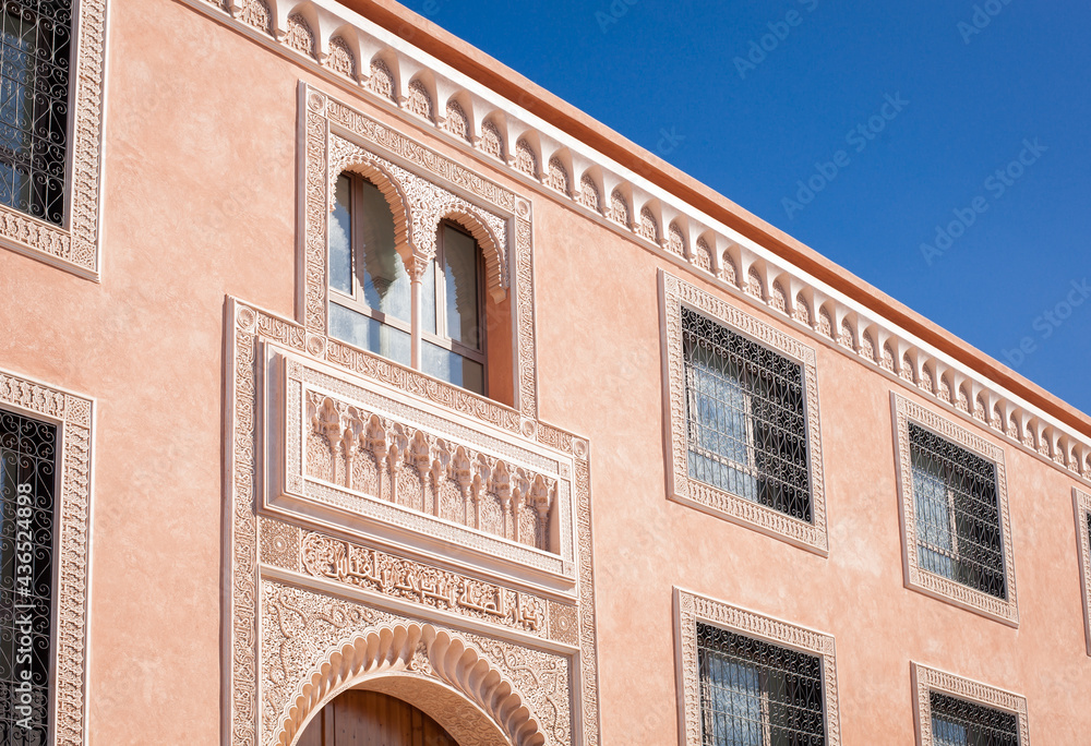 incredible carved exteriors of amazing peaces of heritage remained in the streets of old city Marrakech  