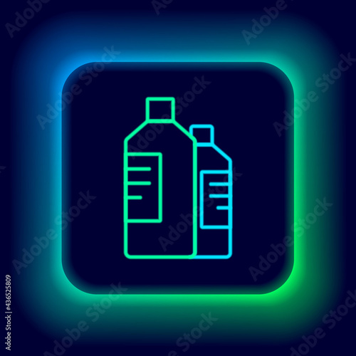 Glowing neon line Plastic bottles for laundry detergent, bleach, dishwashing liquid or another cleaning agent icon isolated on black background. Colorful outline concept. Vector