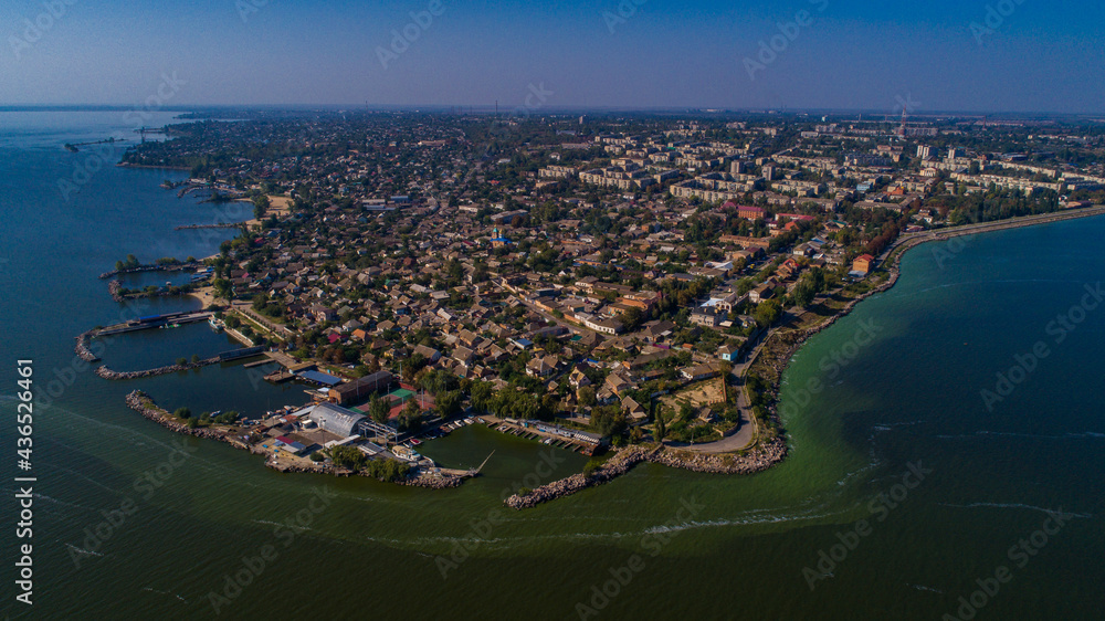 Nice view of the city near the sea from a drone. Summer town Nikopol.