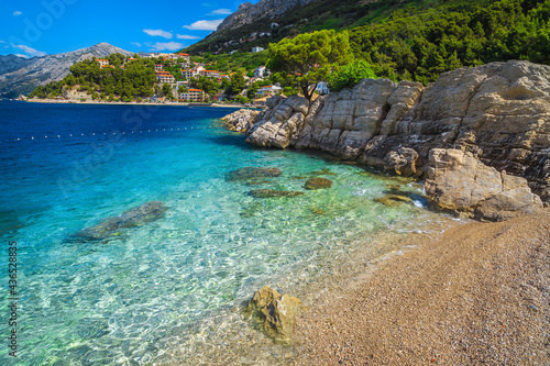 Transparent clean sea and gravelly beach in Brela  Dalmatia  Croatia