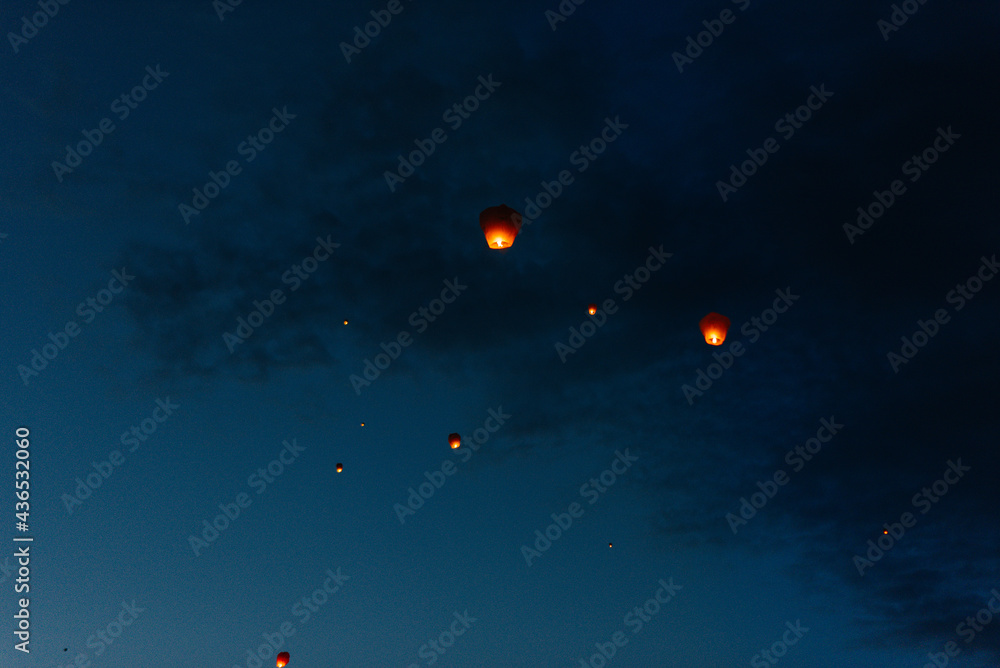 In the evening, at sunset, people with their relatives and friends launch traditional lanterns. Tradition and travel In the evening, at sunset, people with their relatives and friends launch traditional lanterns. Tradition and travel