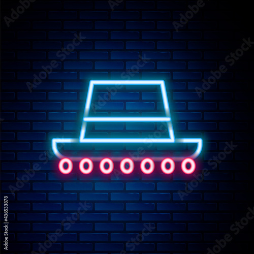 Glowing neon line Traditional spanish hat icon isolated on brick wall background. Colorful outline concept. Vector