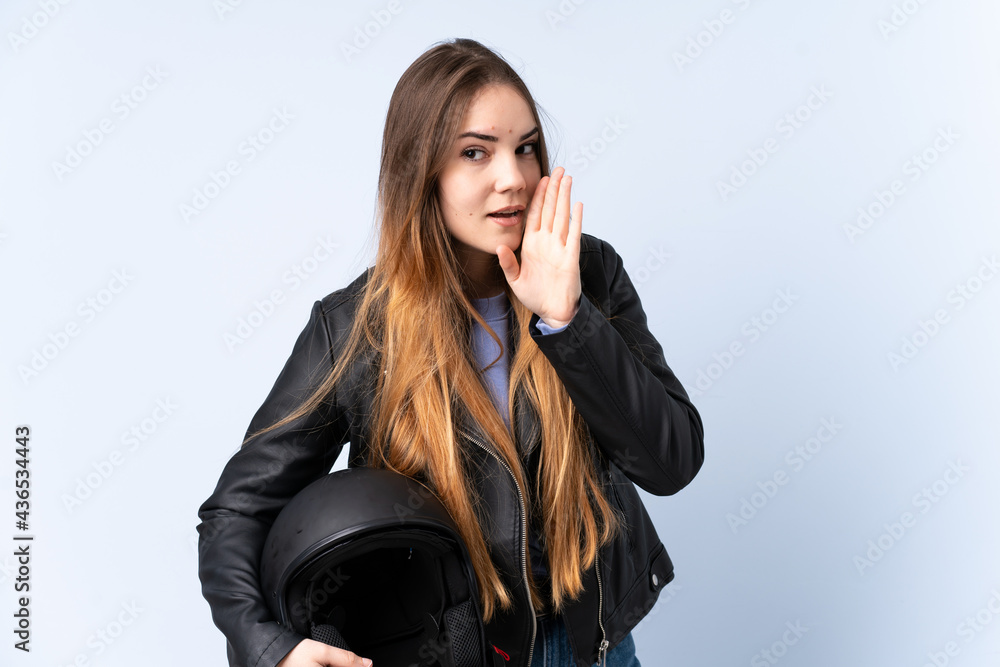 Woman with a motorcycle helmet whispering something Woman with a motorcycle helmet whispering something