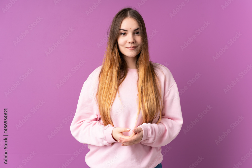 Young caucasian woman isolated on purple background laughing Young caucasian woman isolated on purple background laughing