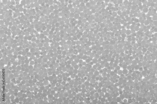 Slice of polystyrene on a gleam. Gradient background