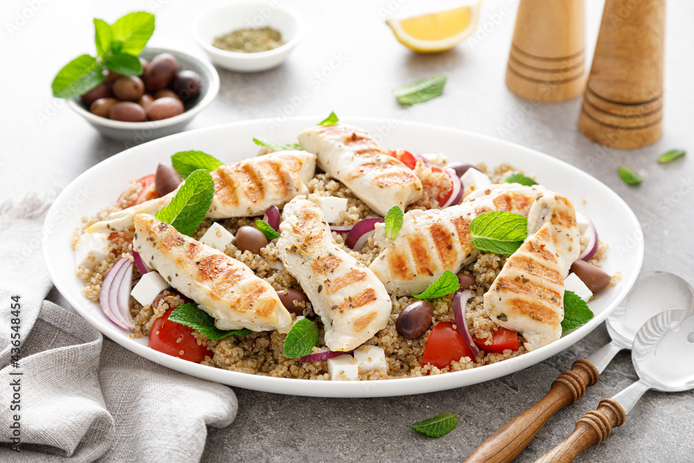 Grilled chicken breast and greek salad with quinoa Grilled chicken breast and greek salad with quinoa