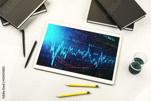 Modern digital tablet monitor with abstract creative financial chart, research and analytics concept. Top view. 3D Rendering