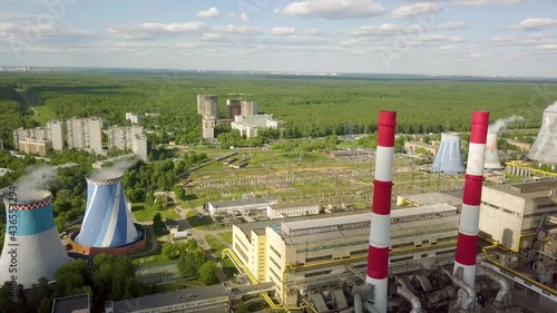 russia moscow 15.05.2021 . video from the drone. flight over the industrial zone of the Golyanovo district. with a beautiful view of the thermal power plant and the Losiny Ostrov National Park photo