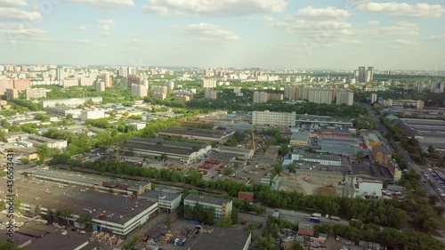 flying over the outskirts of Moscow. mixed type of area, residential quarters and light industry zone photo