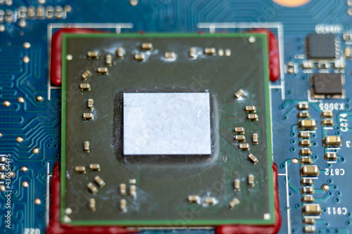 Fototapeta Naklejka Na Ścianę i Meble -  Replacing thermal paste on the processor, integrated circuit