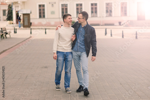 Cute gay couple in the city, tender gentle kissing, smiling © Ivan Zelenin