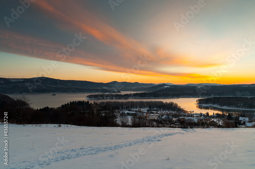 The January sunrise over Lake Solina seen from the viewpoint in Pola  czyk. Polanczyk  Bieszczady Mountains.