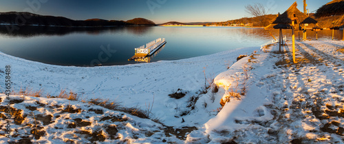 Fototapeta Naklejka Na Ścianę i Meble -  Solińskie Lake seen from the Cypel peninsula in Polańczyk. View of the dam. Polanczyk, Solina, Bieszczady Mountains.