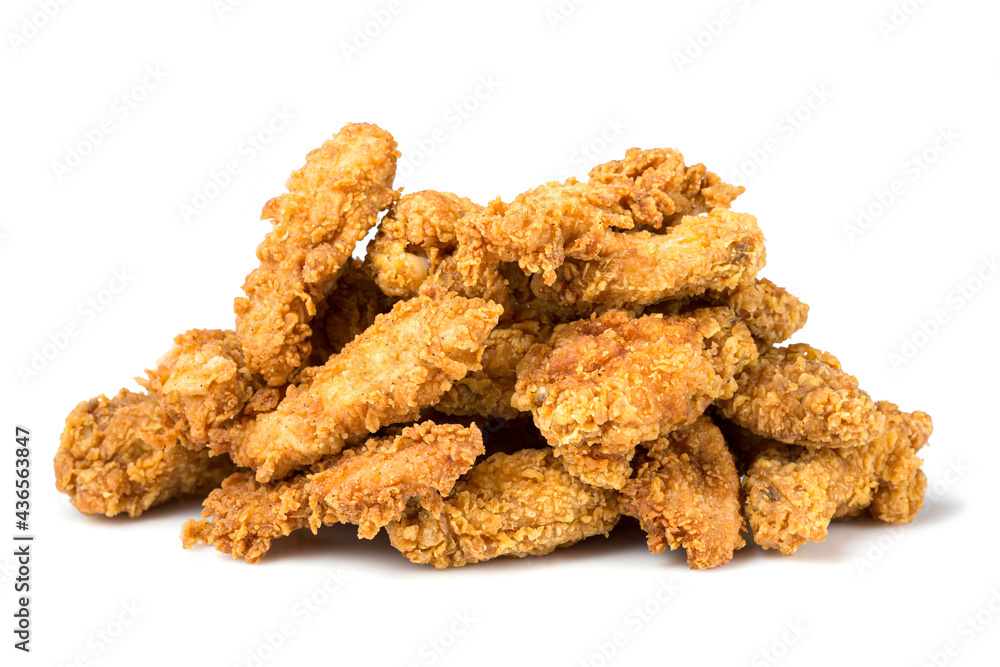 Fresh fried chicken meat or nuggets isolated on white background Fresh fried chicken meat or nuggets isolated on white background