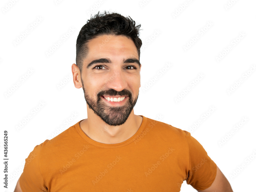 Young man smiling against white background. Young man smiling against white background.