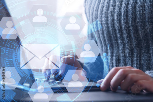 email campaign, direct sales in business concept, newsletter, unrecognized man in gray sweater using laptop to send email