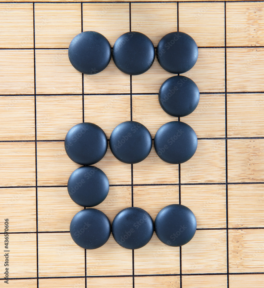 The number 2 placed by the chess piece The number 2 placed by the chess piece