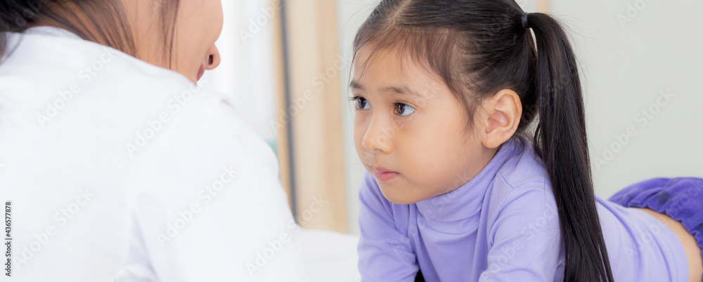 Young asian mom and daughter smiling and eye contact together with care in room, face of mother and girl looking eye with relationship and bonding, emotion and expression, family and love concept. Young asian mom and daughter smiling and eye contact together with care in room, face of mother and girl looking eye with relationship and bonding, emotion and expression, family and love concept.