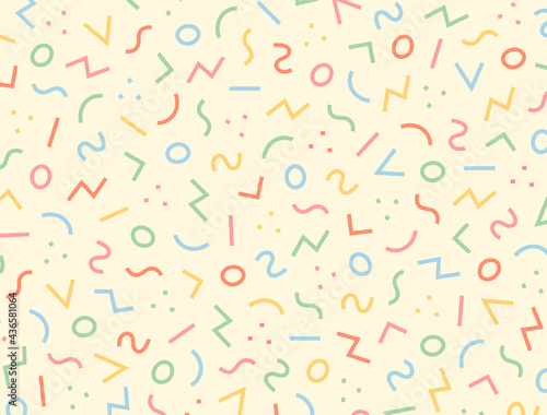 Patterns on a yellow background with jumbled circles and zigzag lines.