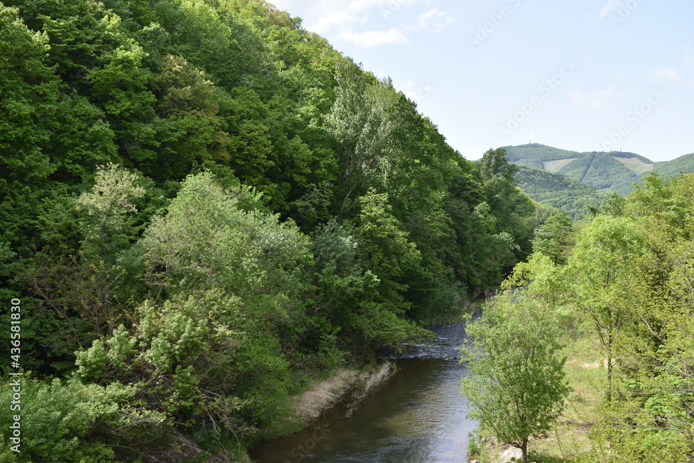 The beautiful green Makomanai mountain along with Toyohira river in Sapporo Japan The beautiful green Makomanai mountain along with Toyohira river in Sapporo Japan