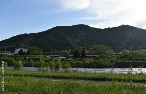 The peaceful countryside scenery with the Makomanai mountain behind in Sapporo Japan