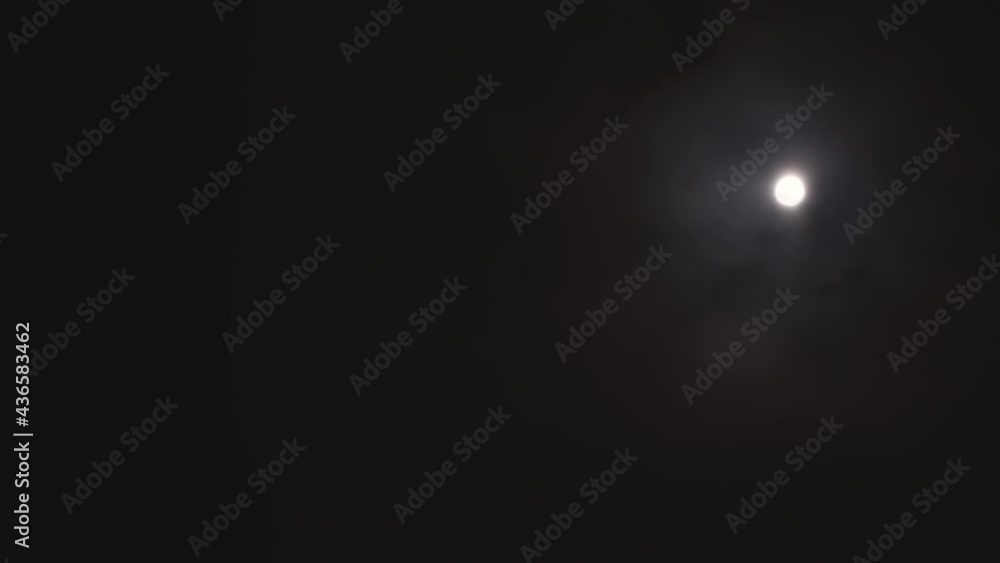 Timelapse moon in the night sky among the clouds Timelapse moon in the night sky among the clouds