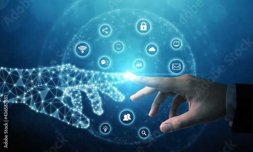 Slika na platnu Hand of businessman touching hand artificial intelligence meaning technology con