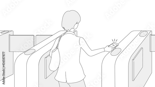 Woman going through the ticket gates