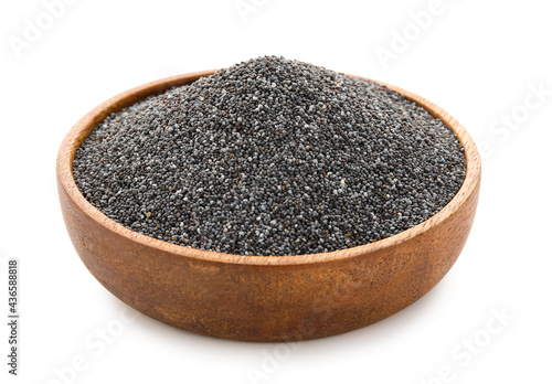 Bowl with poppy seeds on white background