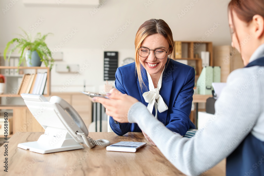 Female accountant working in office Female accountant working in office
