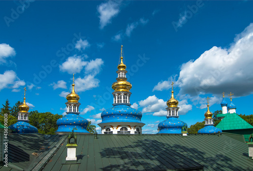 The city of Pechora. Russia. Uspensky Pskov-Pechersk Monastery. The roof and domes of the Intercession Church, built over the Assumption Cave Temple