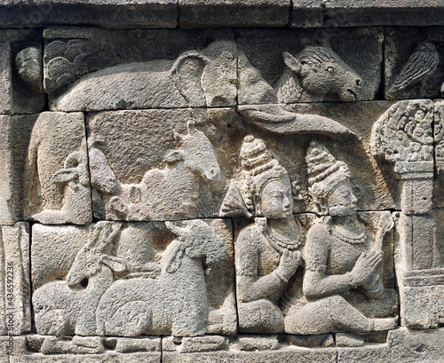 bas-relief panel in the ninth century mahayana buddhist temple of borobodur,  in magelang, java, indonesia      photo