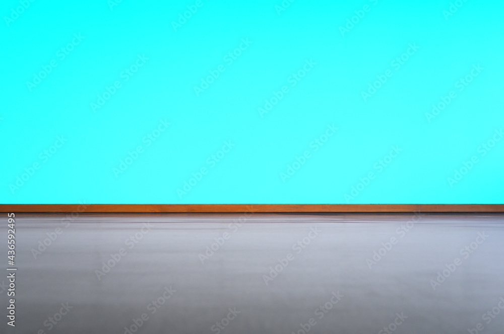 Empty room interior with black floor and green wall background. Free space for display or montage products. Empty room interior with black floor and green wall background. Free space for display or montage products.