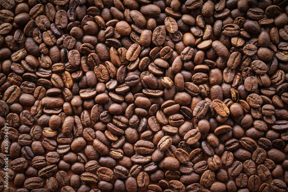 Close up of roasted coffee beans background Close up of roasted coffee beans background