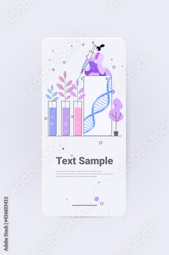 scientist working with DNA of plants in test tubes researcher making experiment in lab genetically modified plants