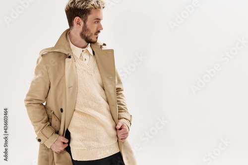 handsome man beige coat fashion modern style
