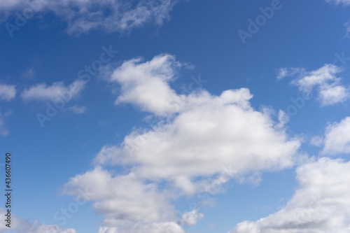 White, Fluffy Clouds In Blue Sky. Background From Clouds. © STOCKIMAGE