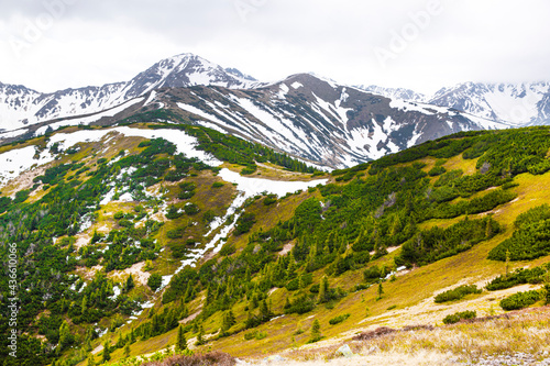 Fototapeta Naklejka Na Ścianę i Meble -  In the high mountains, active summer tourism, beautiful wild nature.