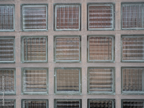 Transparent glass stone wall grouted with cement