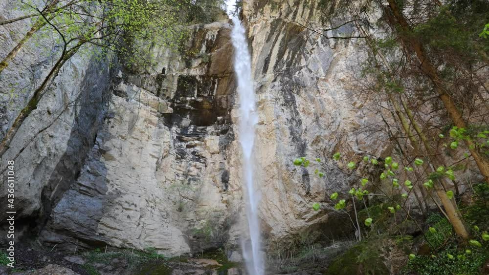 Waterfall near village Iseltwald. Waterfall Isch, Canton Bern, Switzerland. Waterfall near village Iseltwald. Waterfall Isch, Canton Bern, Switzerland.