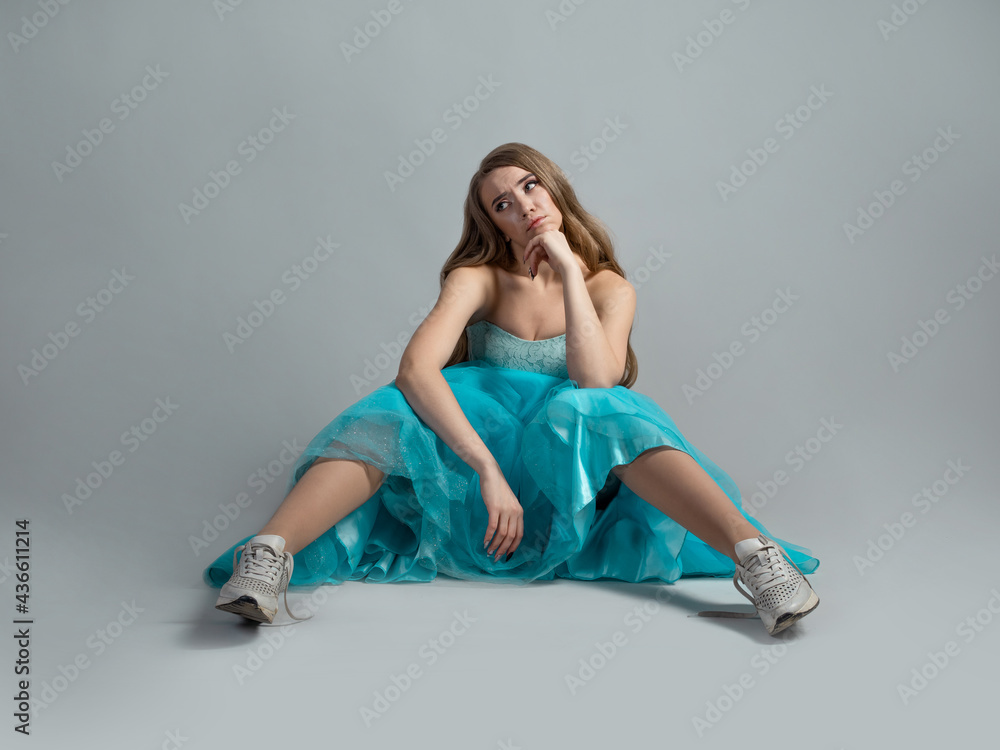 Naklejka premium cheerful princess in a lush blue dress and sneakers, modern style.