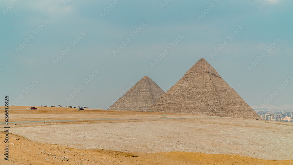 Panorama of the pyramids in Giza, Egypt on a foggy day Panorama of the pyramids in Giza, Egypt on a foggy day
