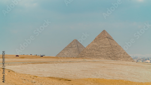 Panorama of the pyramids in Giza, Egypt on a foggy day
