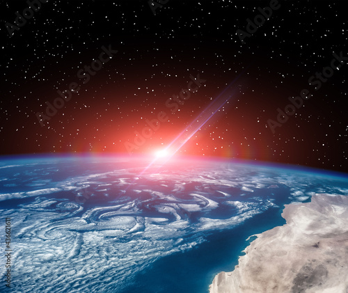 Fototapeta Naklejka Na Ścianę i Meble -  Sunrise  from space. The elements of this image furnished by NASA.
